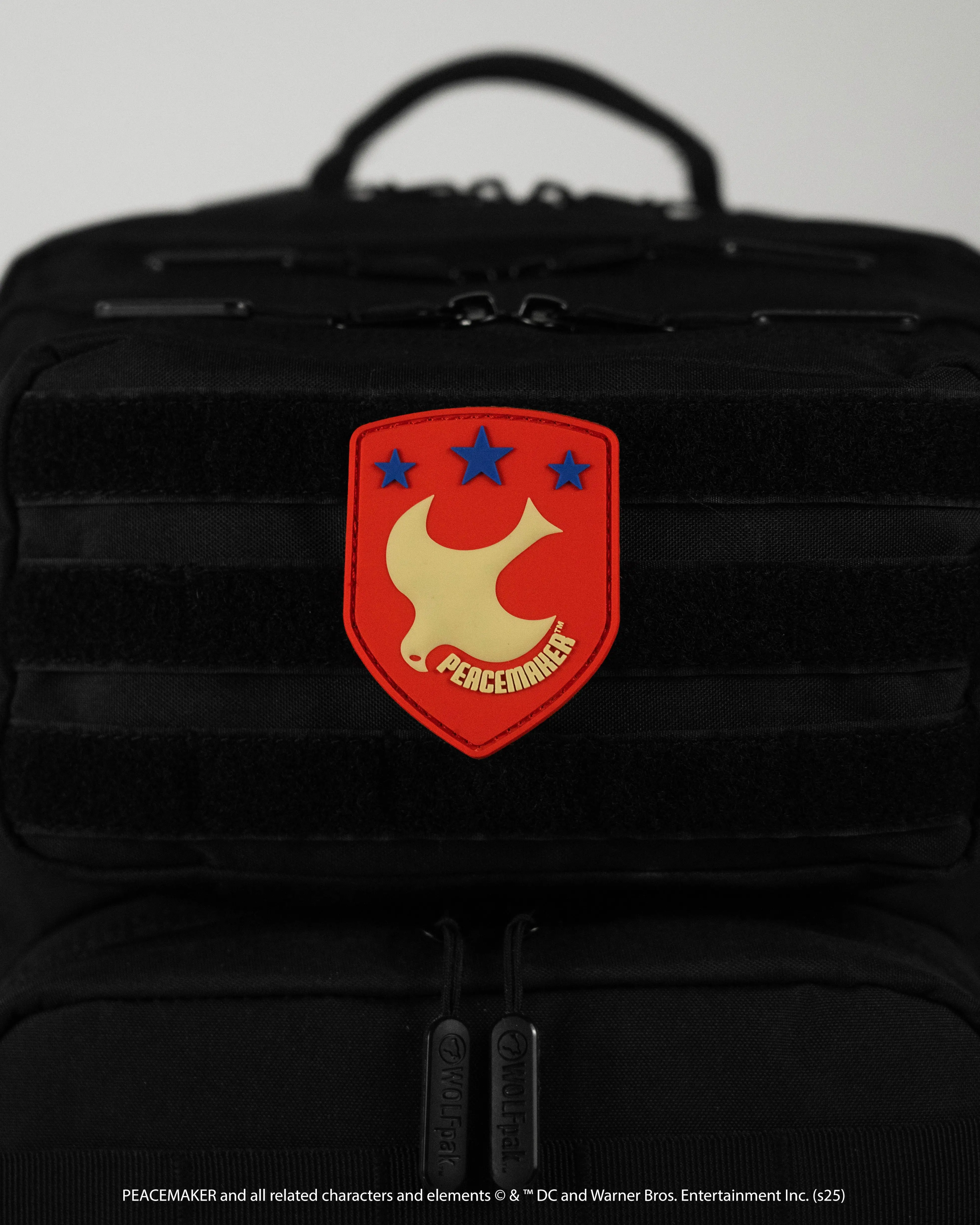 DC Licensed Peacemaker Shield Patch, Shield Shape Embroidery Patch, Rubber Material, Hook Loop Fasten Sewing Supply