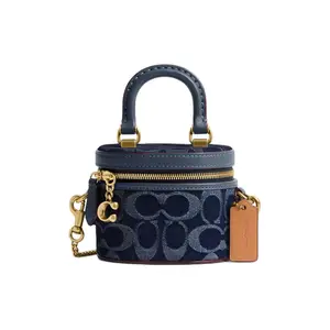 COACH Trail 12 Zip-Top Crossbody Bag for Women – Denim and Premium Calfskin, Brass Accents with Blue Details