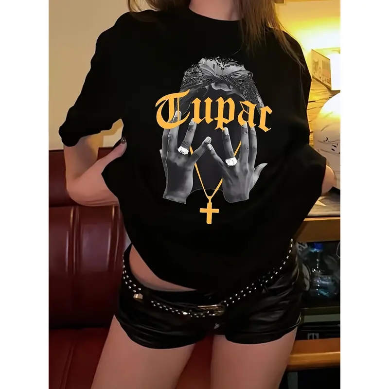 Women's Soft & Comfortable Graphic Tee Classic Black T-Shirt with Artistic "Tupac" Print Cross Necklace Design & Golden Lettering Perfect for Casual Attire