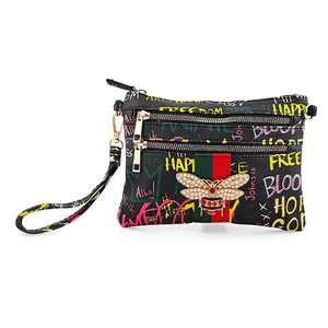 Chunma Black and Multi Color Graffiti Bee Faux Leather Clutch Crossbody Bag