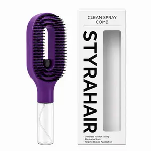 Hair brush with spray