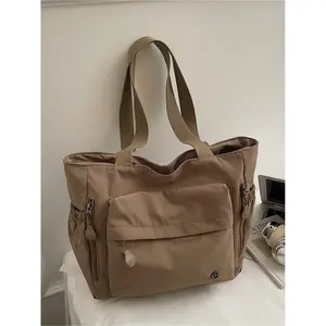 Large capacity women's bag Korean version 2025 new Japanese fashion simple Western style artistic one shoulder tote bag canvas bag college student computer bag handbag multi pocket simple casual armpit bag Casual commuter bag suitable for work, shopping
