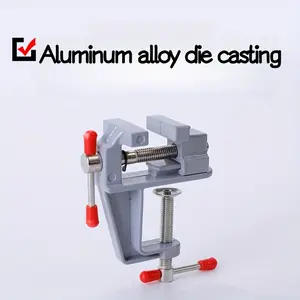 Manual bench vise - Heavy-duty compact mini precision vise for crafts, woodworking & repair. Red rubber handle, durable metal, sturdy, strong clamping, workbench accessory, no power needed. Premium tool for repair pros.