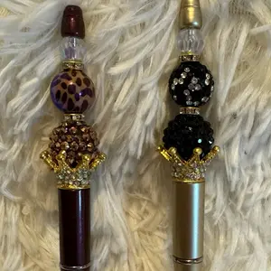 Crown with bead pen
