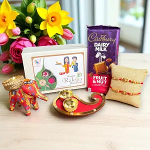 Cherished Rakhi Gift Hamper | Ganesh Rakhi Set with Gifts, Chocolate & Candle | Celebrate Raksha Bandhan with Bhabhi & Bhai | Symbol of Love