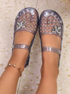 Retro rhinestone transparent sandals for women, decorated with crystal bows, hollowed out and breathable, anti slip soft soled mother's shoes, summer daily wearing jelly sandals, beach sandals, Glitter Sandal