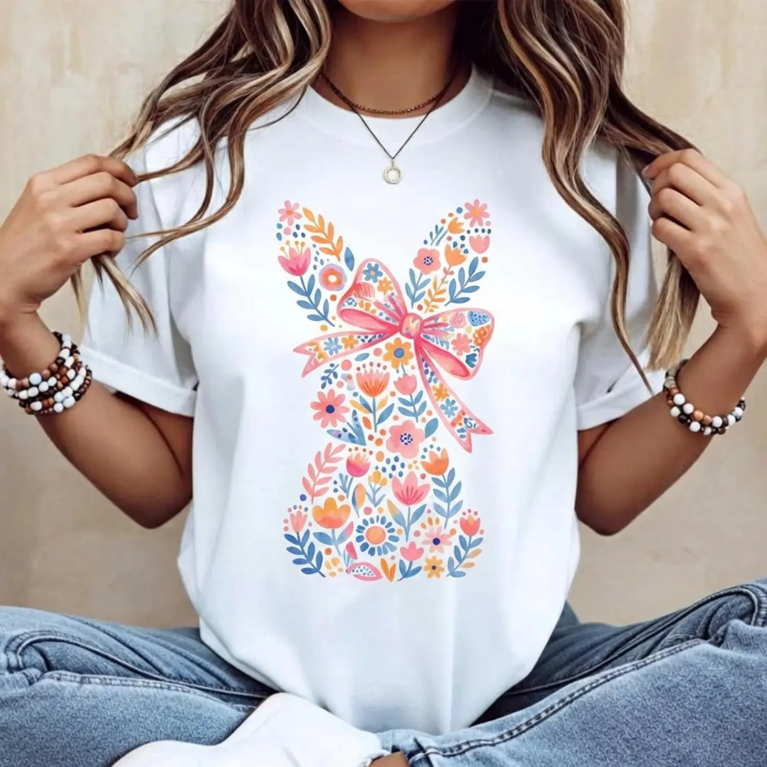 Women's Casual Round Neck Short Sleeve T Shirt Featuring Easter Bunny with Pink Bow and Colorful Swirls Print Perfect for Spring Festival and Holiday Celebrations