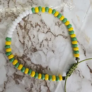 Pulso ajustable de Orula con Obatala