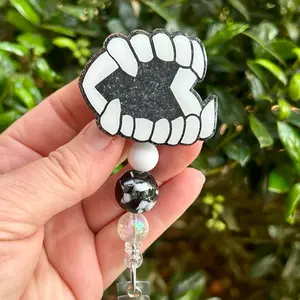 Vampire Teeth Badge Reel
