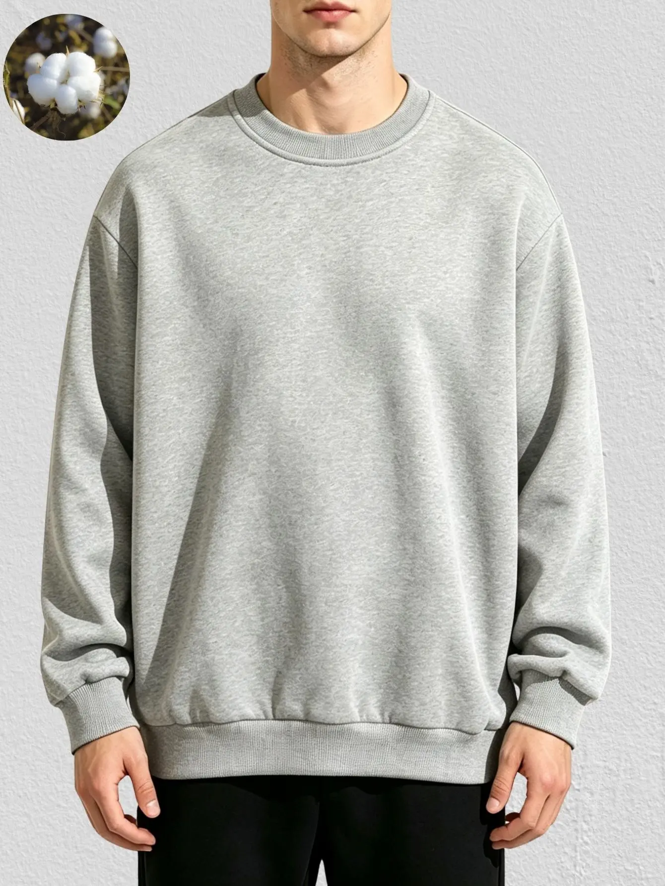 American minimalist solid-color crewneck sweatshirt made from heavyweight cotton fabric, featuring a relaxed fit with dropped shoulders—a casual long-sleeve top that’s versatile.