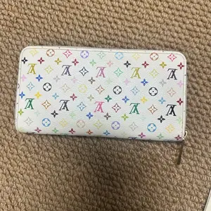 Pre-owned Louis Vuitton Multicolore Zippy Wallet|18574520