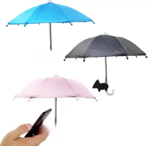 A Triple Set of Outdoor Phone Umbrellas with Adjustable Suction Cup Stands for Enhanced Sun Protection and Hands-Free Mobile Viewing