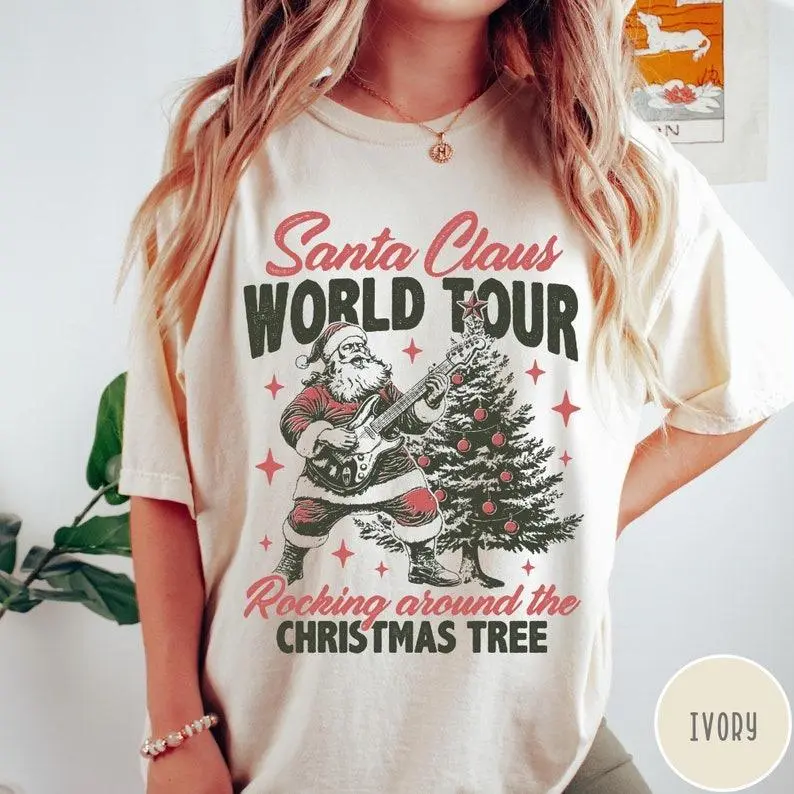 Comfort Colors Cute Santa Claus World Tour T-Shirt, Retro Christmas Shirt, Retro Holiday Tee, Rocking Around Xmas Graphic Top, Trendy Festive Shirt, Unisex Christmas Tee for Men & Women
