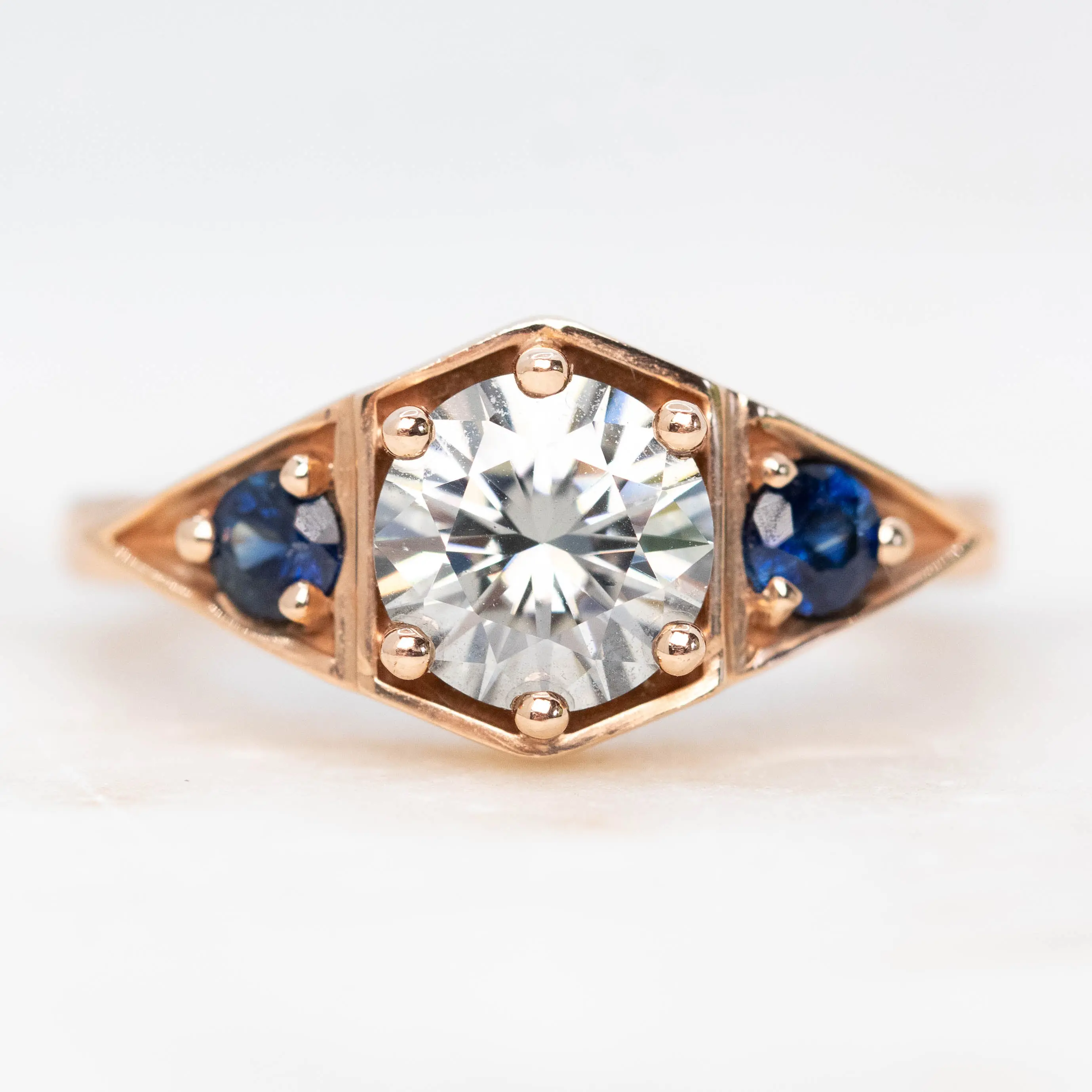 Cassia Ring with a 1.00 Carat Round Gray Moissanite and Blue Sapphire Accents in 10k Rose Gold - Ready to Size and Ship