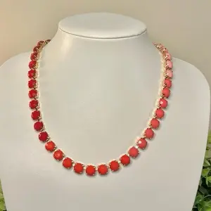 The Jordan Jewel Candy Vibes Bubblegum Ombré Necklace with Vibrant Pink and Red Beads and Gold Accents for Stylish Outfits