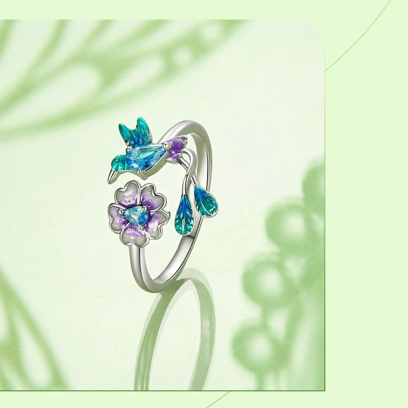 Présentation du produit : Bague ajustable BAMOER en argent sterling 925 avec motif floral et oiseau pour femme. Bague colibri en cristal, bijou scintillant à porter au quotidien, cadeau idéal pour une petite amie, une mère ou une épouse. 19