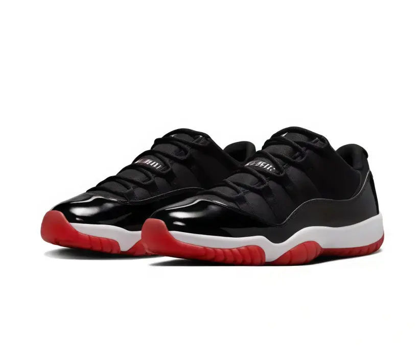 Glossy black patent mesh low-top retro basketball sneakers featuring scuff-proof dual-tone bright red white layered rubber outsoles, tear-resistant sweat-wicking soft perforated patent mesh leather construction