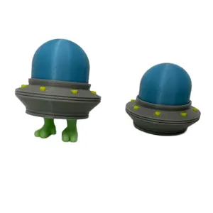 Glow in the dark UFO Keychain with retracting alien toes