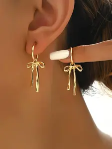 A pair of fashionable and elegant bow tie tassel earrings, suitable for daily wear, vacation dates, and other occasions, and also a surprising and exquisite small gift