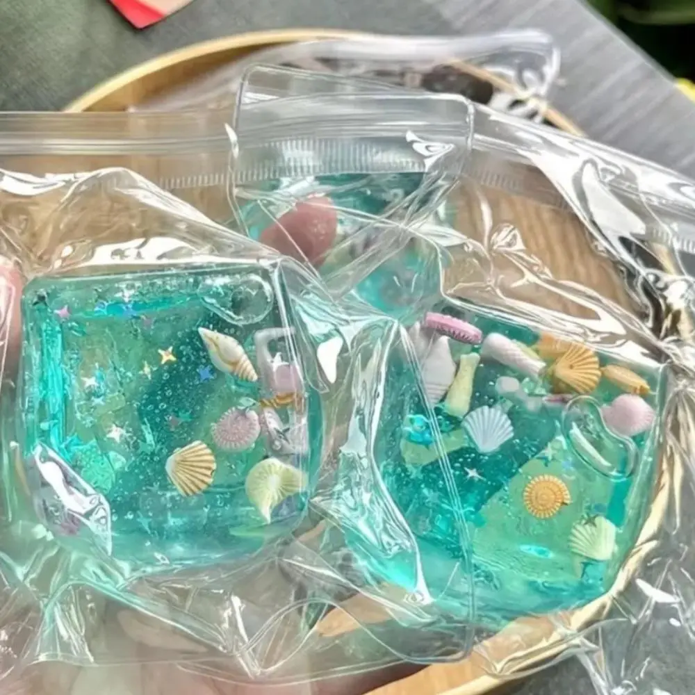 Ocean-Themed Stress-Relief Gift — A soothing, handheld stress-buster. Adorned with seashells and starfish, these durable, squeezable novelties feature lifelike designs—perfect as "ice cube" stress balls, hand-squeezing toys, or bouncy fidget tools.