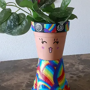 happy rainbow decoupage terracotta pot person