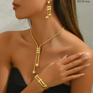Women's 3-Piece Gold Costume Jewelry Set - Mesh Chain Lariat Necklace, Earrings, Adjustable Bracelet - Female Bow-Accented Luxury Accessory for Daily, Party Use