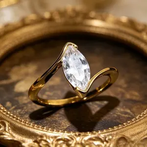 Luxury Golden-Tone Marquise-Cut Engagement Ring for Women, Twisted Band Elegant Promise Ring, Sleek Statement Jewelry, Ideal Gift for Valentine's Day, Parties & All Special Occasions