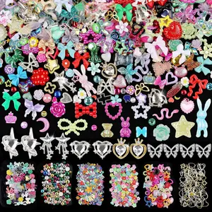 650pcs Mixed 3D Nail Charms Kit, 12pcs Luxury Metal Nail Rhinestones and 250pcs Resin Butterfly Flower Star Heart Bow Charms with 400pcs Flatback Pearls Rhinestone Metal Gems Charms (Mixed Color)