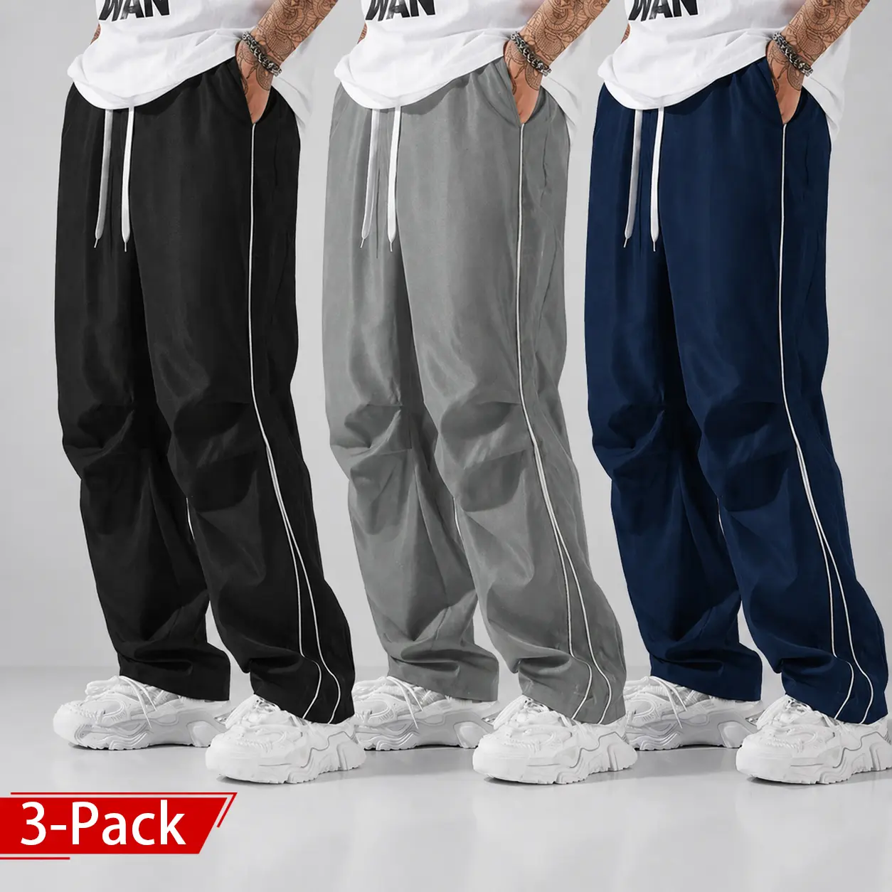 Men’s casual long pants available in packs of 2–3 pieces, featuring a loose fit, drawstring elastic waistband, and tie straps on both pant legs; outdoor casual street-style loose long pants. This men’s casual long pants is versatile and suitable for four