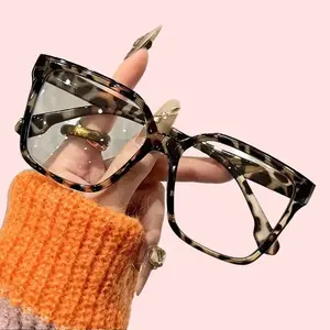 Sleek square frames meet artistic leopard accents! Ladies clear fashion glasses
