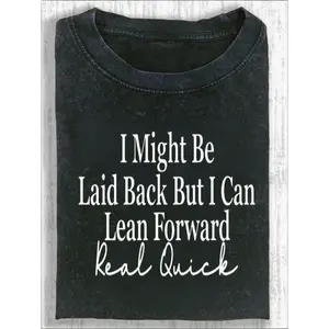 Unisex Motivational Graphic Tee - Bold Cursive "I Might Be Leisurely But I Can Lean Forward Really Fast" Print on Light Wood Grain Crewneck, Fashionable Casual T-Shirt for Everyday Wear