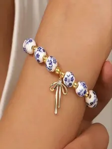 Elegant Oriental Blue-And- Porcelain Flower Beaded Bracelet, Elastic Pearl Jewelry Gift, Romantic Butterfly Knot Design