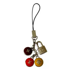 Pre-owned Louis Vuitton bag keychain phone charm Authentic with COA