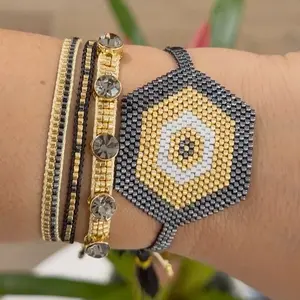 Beautiful set of 4 gold and silver Miyuki evil eye bracelets