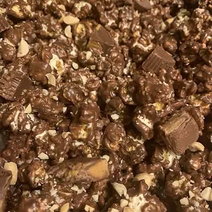 Chocolate Peanut Surprise Popcorn - Rich Chocolate Coated Popcorn with Crispy Peanut Bits and Peanut Butter cups for a Sweet Snack
