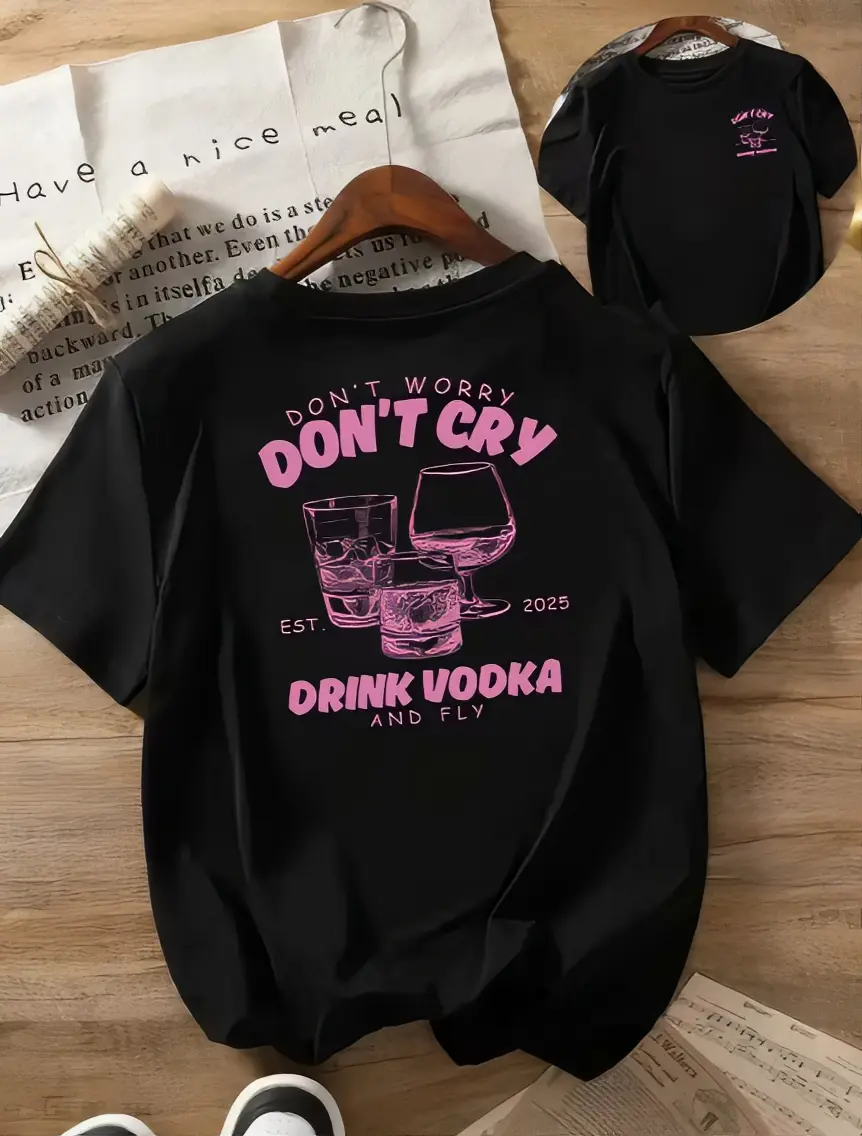 Don't Worry Don't Cry Drink Vodka and Fly T-Shirt Black Crew Neck Short Sleeve with Pink Text and Glass Design