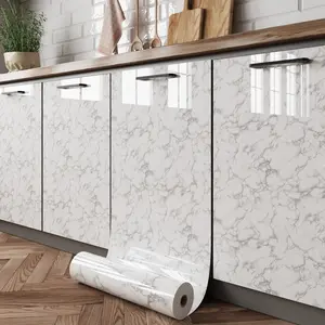 Self-adhesive high-gloss cabinet film with a marble pattern, waterproof and oil-resistant. Ideal for kitchen cabinets, doors, and backsplashes. Peel-and-stick, removable Decorative wall sticker for home décor in kitchens, living rooms, and bedrooms.