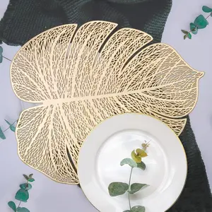 2-Pack Golden Monstera Placemats – Heat-Resistant Non-Slip Table Mats, Tropical Leaf Decor, Washable PVC Placemats for Kitchen & Restaurant.