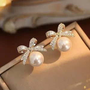 Exquisite Micro-Inlaid Zircon Bow Stud Earrings for Women Jewelry Rhinestone Bowknot Synthetic Pearl Earrings for Bridesmaids Wedding Party Accessories Bridal Costume Accents Bow Tie Themed Gifts