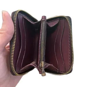 Mini leather zip around wallet with card and cash pockets