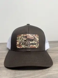 Old Squaw Camo Patch on brown and white pacific trucker hat