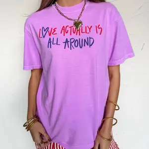 Comfort Colors Shirt - Purple Tee with 'Love Actually Is All Around' Graphic for Casual Wear
