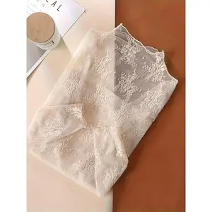 Chic Long-Sleeve Lace Turtleneck Top for Women, Perfect for Autumn And Winter Layering.