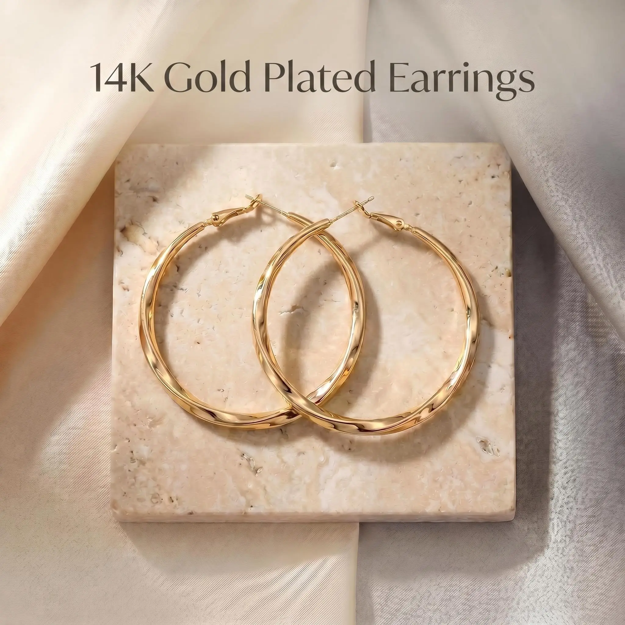 14K Gold Plated Large Twisted Hoop Earrings, 50mm Diameter, 5mm Width Hypoallergenic, nickel-free lead-free.Anti-tarnish and fade-resistant, these lightweight women’s earrings are perfect for everyday wear and parties.The ideal gift for your loved one.