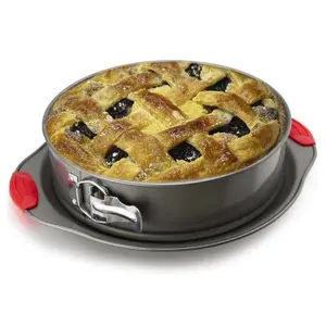 Boxiki Kitchen 10 Inch Nonstick Springform Pan, Professional Spring Form and Cheesecake Baking Mold, Leakproof Cake Pan With Silicone Handles