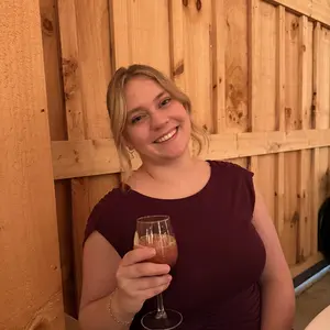 Customer wearing the Athena Gown