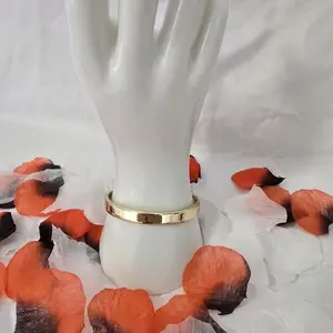 Thick gold laminated 14K bangle bracelet, size 8, snap closure, polished finish.