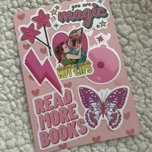 Curated Kindle clear case background with colorful bookish stickers on premium cardstock