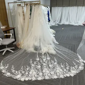 Custom veil: cathedral length  ivory color lace all around comb