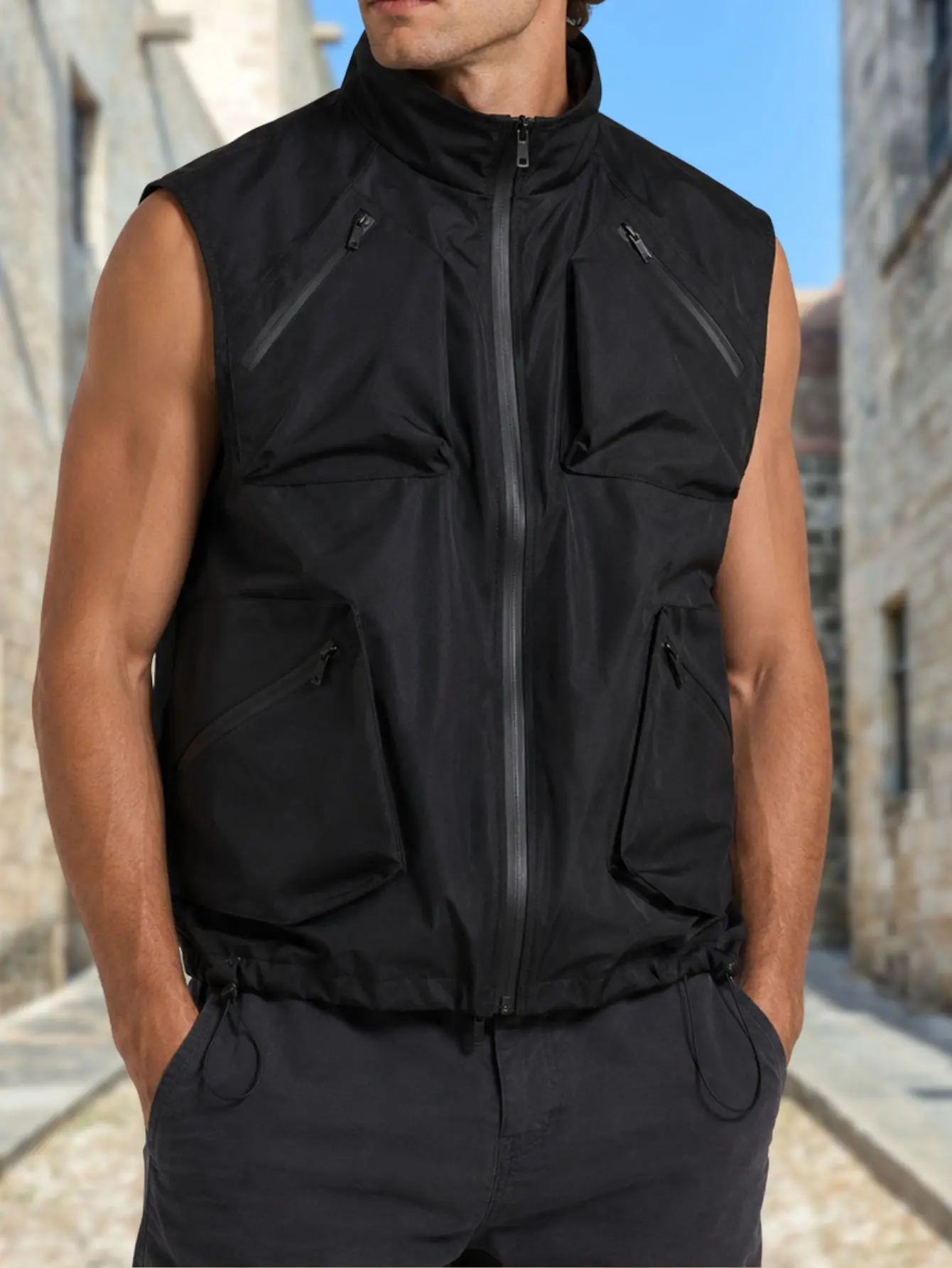 Men’s tactical functional vest with multiple pockets and a stand collar, drawstring waist, sleeveless design—casual and versatile for everyday wear